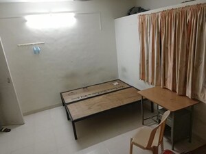 Bedroom in 1 BHK Apartment at Jagrut CHS, Gokhalenagar – for Rent