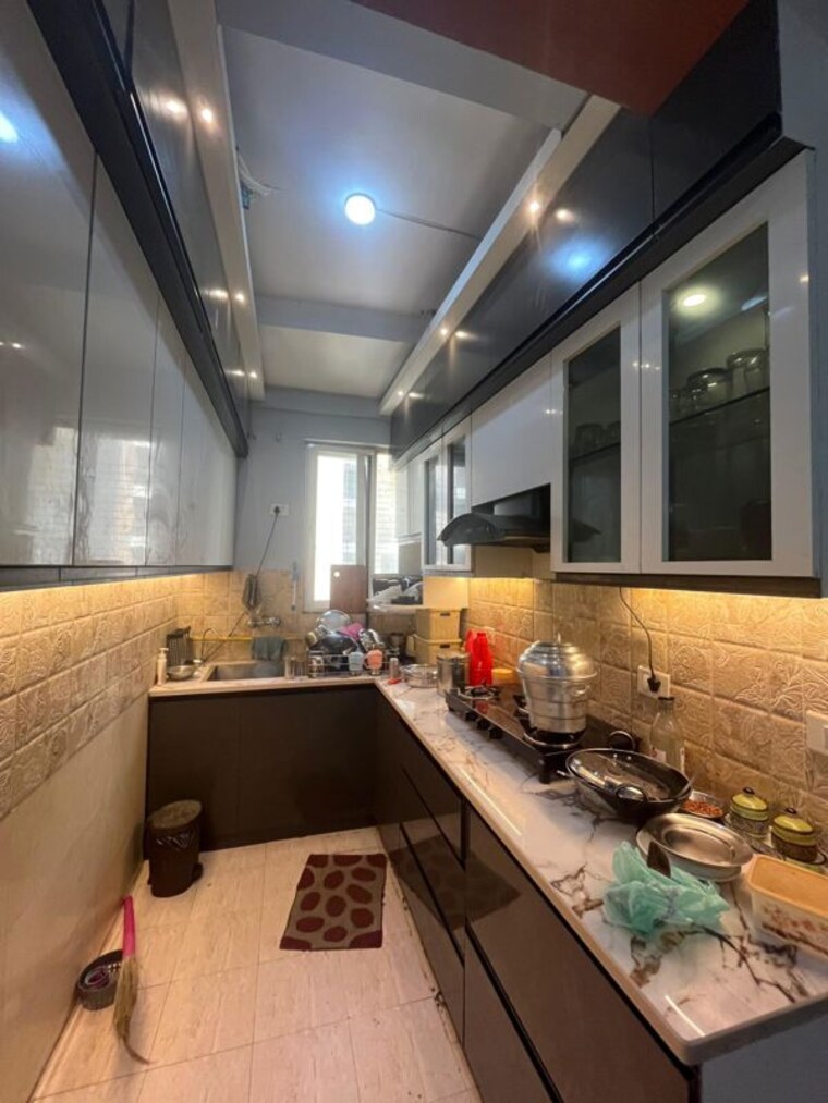 Kitchen, amrapali-kingswood 3 Bedroom 1115 Sq.Ft. Apartment In Sector 4 Greater Noida Greater Noida 10375523