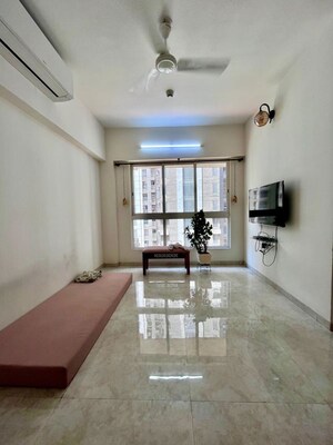 Living Room in 1.5 BHK Apartment at Lodha Amara, Kolshet Road – for Sale