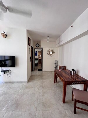 Living Room in 1.5 BHK Apartment at Lodha Amara, Kolshet Road – for Sale
