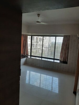 Room in 2 BHK Apartment at Satellite Garden, Goregaon East – for Rent