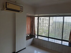 Room in 2 BHK Apartment at Satellite Garden, Goregaon East – for Rent
