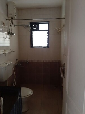 Bathroom in 2 BHK Apartment at Satellite Garden, Goregaon East – for Rent