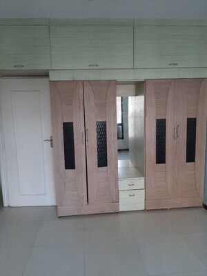 Living Room in 2 BHK Apartment at Satellite Garden, Goregaon East – for Rent