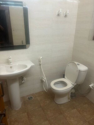 Bathroom in 3 BHK Apartment at AWHO Brahmaputra Apartments, Sector 29 – for Rent