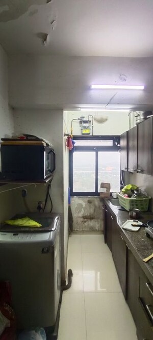 Kitchen in 2 BHK Apartment at Kanakia Rainforest, Andheri East – for Rent