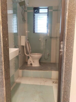 Bathroom in 2 BHK Apartment at Kamdhenu Pride, Kharghar – for Rent
