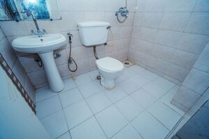 Bathroom in 2.5 BHK Apartment at Amrapali Zodiac, Sector 120 – for Rent