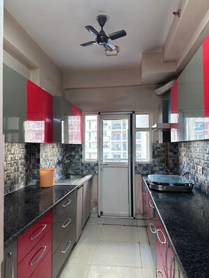 Kitchen in 3 BHK Apartment at Arun Vihar, Sector 29 – for Rent