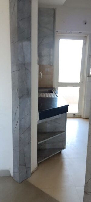 Kitchen in 2.5 BHK Apartment at AWHO Shanti Vihar, Sector 95 – for Sale