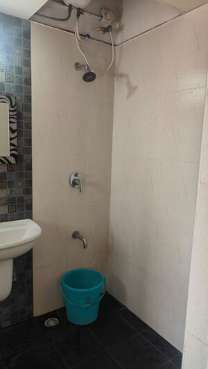 Bathroom in 2 BHK Apartment at Kumar Pebble Park, Hadapsar – for Rent