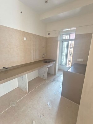 Kitchen in 2 BHK Apartment at Dosti West County, Balkum Pada – for Rent
