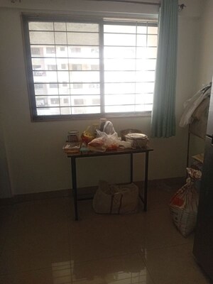 Room in 2 BHK Apartment at Magarpatta City Cosmos, Magarpatta Road – for Rent