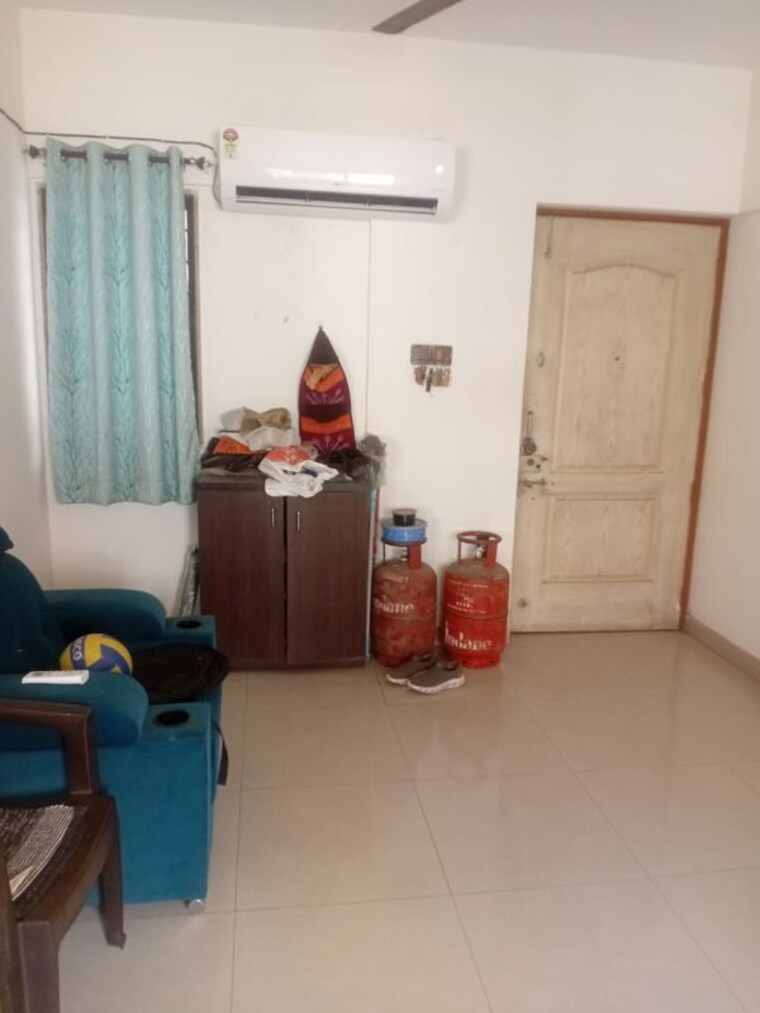 Living Room, magarpatta-city-cosmos 2 Bedroom 1050 Sq.Ft. Apartment In Magarpatta Road Pune 10375731