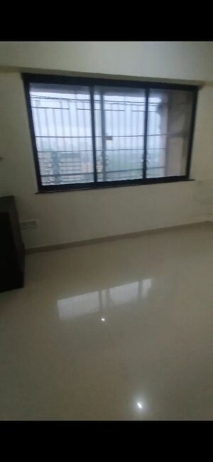 Room in 4 BHK Apartment at Whispering Heights, Malad West – for Sale
