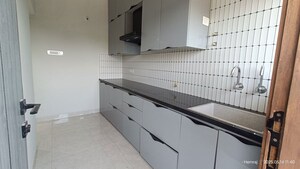 Kitchen in 2 BHK Apartment at Buildwell Eminence, Jakhiya – for Sale