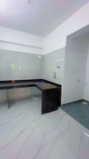 Kitchen in 1 BHK Apartment at Wadgaon Sheri – for Rent