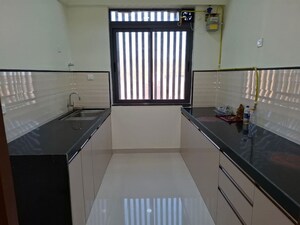 Kitchen in 2 BHK Apartment at Dynamix Divum, Malad East – for Rent