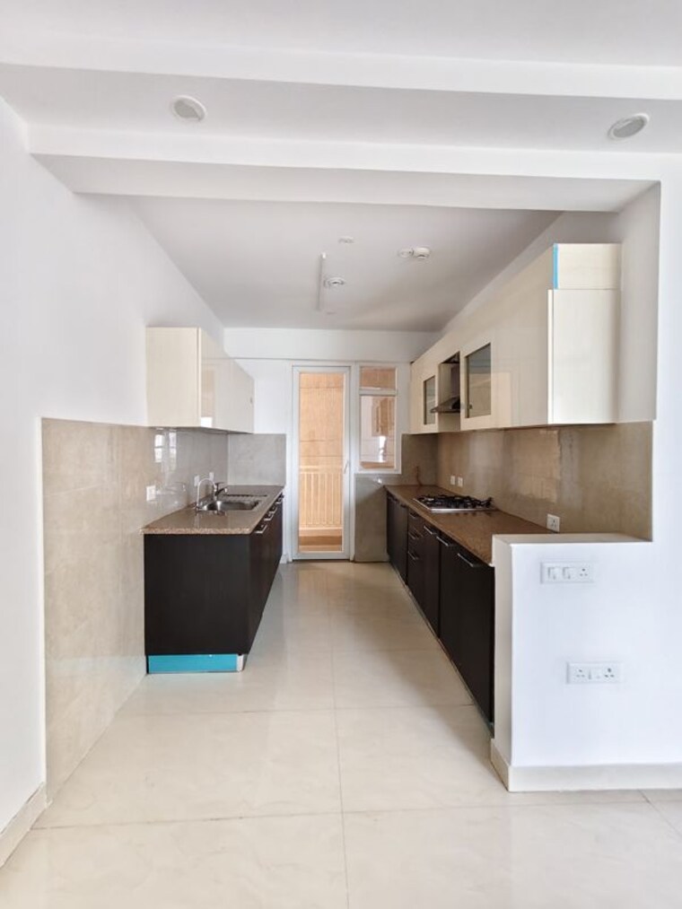 Kitchen, real-anchor-world-residency 3 Bedroom 1935 Sq.Ft. Apartment In Indrapuram Ghaziabad 10375884