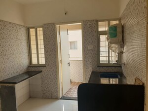 Living Room in 1 BHK Apartment at Gurukrupa Aero Nest, Undri – for Sale