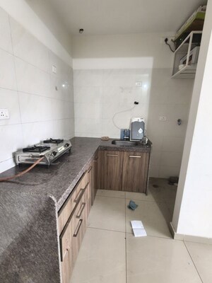 Kitchen in 1 BHK Apartment at Duville Riverdale Suites, Kharadi – for Rent