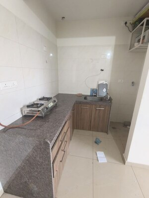 Kitchen in 1 BHK Apartment at Duville Riverdale Suites, Kharadi – for Rent