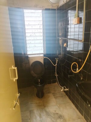 Bathroom in 2 BHK Apartment at Nivedita Garden, Kondhwa – for Rent