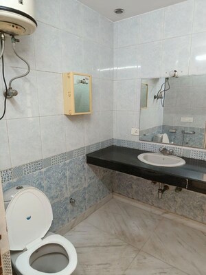 Bathroom in 4 BHK Apartment at Sheeba Apartment, Sector 28 – for Rent