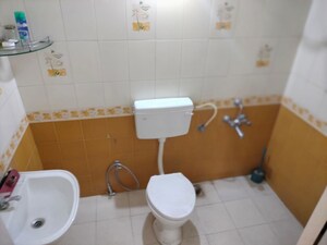 Bathroom in 2 BHK Apartment at Ram Nagar – for Sale