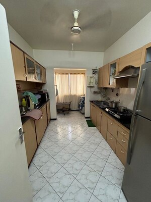 Kitchen in 2 BHK Apartment at Sunshree Woods, Nibm Road – for Rent