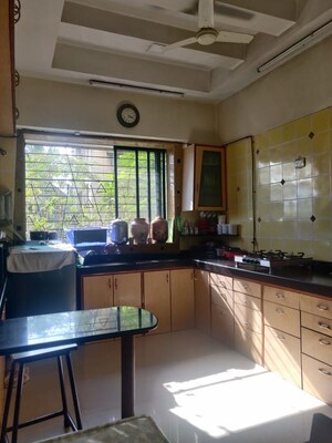 Kitchen in 2 BHK Apartment at Mahesh Sadan, Vile Parle West – for Rent