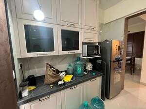 Kitchen in 2 BHK Apartment at Paradise Sai World Empire, Kharghar – for Rent