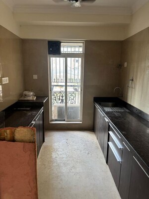 Kitchen in 2 BHK Apartment at Crescent Heritage, Khar West – for Rent