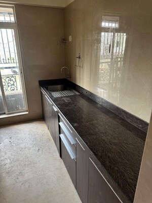 Kitchen in 2 BHK Apartment at Crescent Heritage, Khar West – for Rent