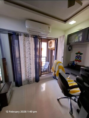 Living Room in 2 BHK Apartment at Brijdham Nanddham CHS, Goregaon West – for Rent