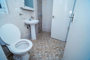 Bathroom in 3.5 BHK Apartment at Amrapali Zodiac, Sector 120 – for Rent