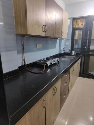 Kitchen in 2 BHK Apartment at Atul Blue Monarch, Andheri East – for Rent