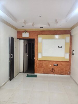 Living Room in 2 BHK Apartment at Swarna CHS, Kharghar Sector 7 – for Rent