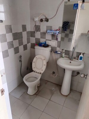 Bathroom in 2 BHK Apartment at Gaur Atulyam Gravity, Omicron I Greater Noida – for Rent
