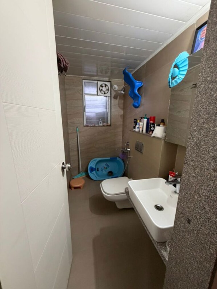 Bathroom, rohan-ananta 2 Bedroom 685 Sq.Ft. Apartment In Tathawade Pune 10376338