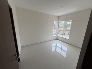 Room in 2 BHK Apartment at Pride Purple Park Titan, Hinjewadi – for Rent