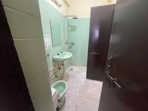 Bathroom in 4 BHK Apartment at Sector 7 Dwarka – for Rent