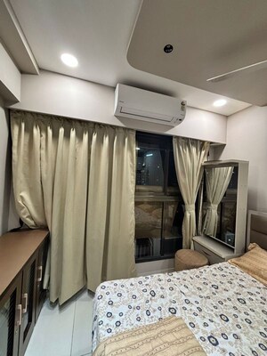 Bedroom in 2 BHK Apartment at Kanakia Rainforest, Andheri East – for Rent