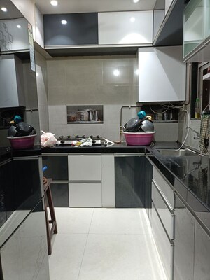 Kitchen in 2 BHK Apartment at Vedant Shree Gopinath Sublime, Kalwa – for Rent