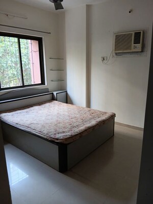 Bedroom in 2 BHK Apartment at Acme Enclave, Malad West – for Rent