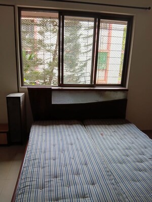 Bedroom in 2 BHK Apartment at Acme Enclave, Malad West – for Rent