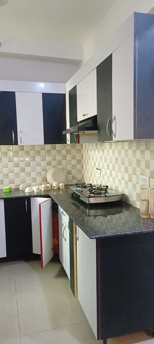 Kitchen in 2 BHK Apartment at Gaur City 6th Avenue, Sector 4 Greater Noida – for Rent