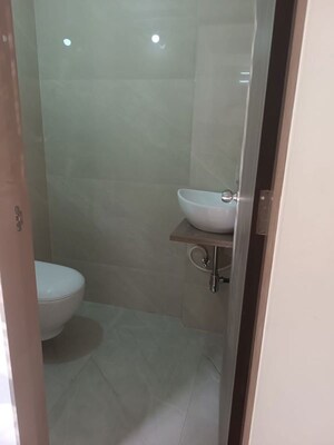 Bathroom in 1 BHK Apartment at Puranik City, Kasarvadavali – for Rent