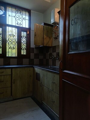 Kitchen in 3 BHK Apartment at Vasant Enclave – for Rent