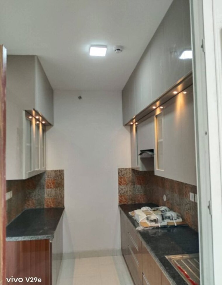 Kitchen, hero-homes-gurgaon 3 Bedroom 1359 Sq.Ft. Apartment In Sector 104 Gurgaon 10376636